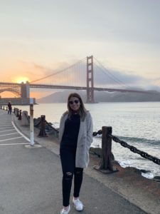 A photo of myself with the Golden Bridge as a background