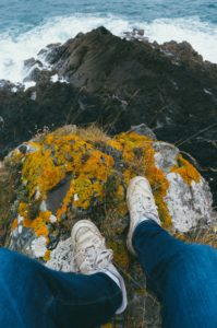 Person standing on a rock